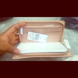 Micheal Kors Pink Zip-Around Wallet